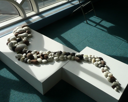 felted rock installation